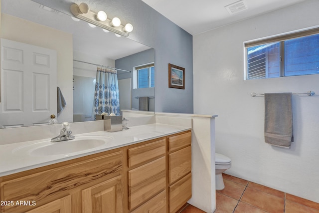 bathroom featuring vanity, visible vents, curtained shower, tile patterned floors, and toilet