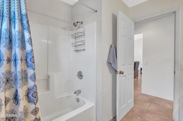 full bath featuring tile patterned floors and shower / tub combo