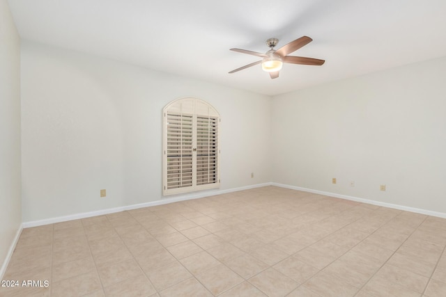 spare room featuring ceiling fan