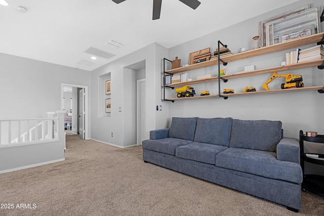 living room featuring carpet flooring and ceiling fan