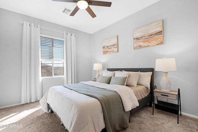 bedroom with ceiling fan and carpet flooring