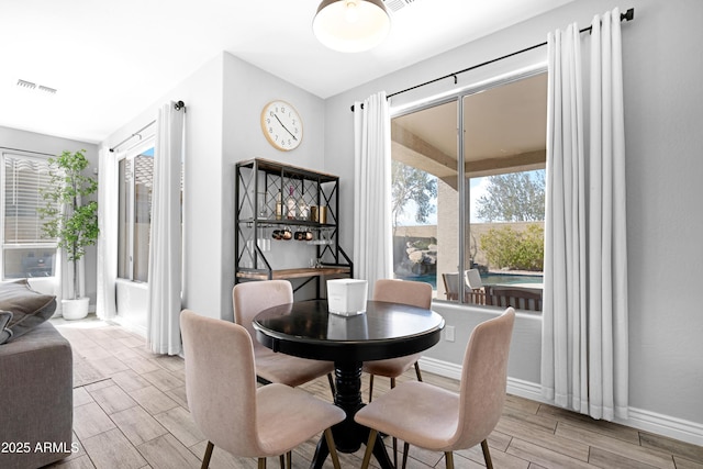 dining room featuring a healthy amount of sunlight