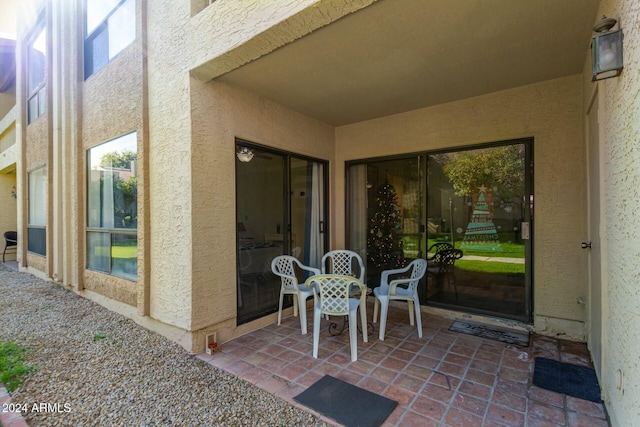 property entrance with a patio area