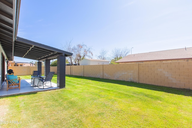 view of yard featuring a patio and a fenced backyard