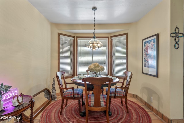 dining area with a chandelier