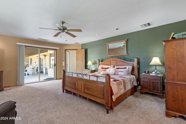 bedroom featuring carpet floors, ceiling fan, and access to exterior