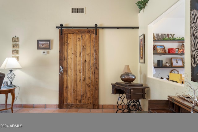 foyer with a barn door