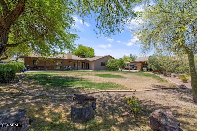 view of front of property with a front lawn