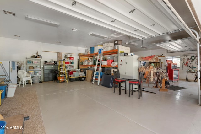 garage with white refrigerator