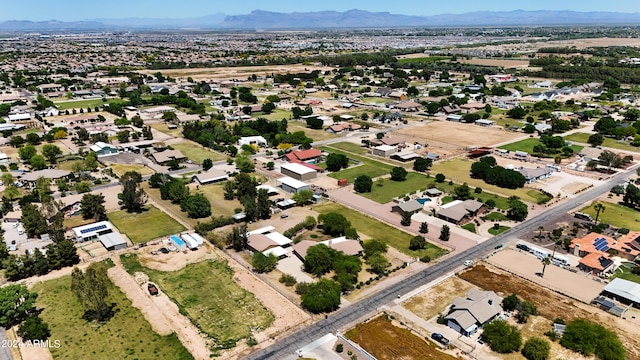 drone / aerial view featuring a mountain view