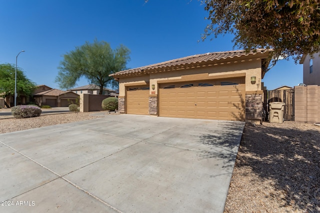 view of property exterior featuring a garage