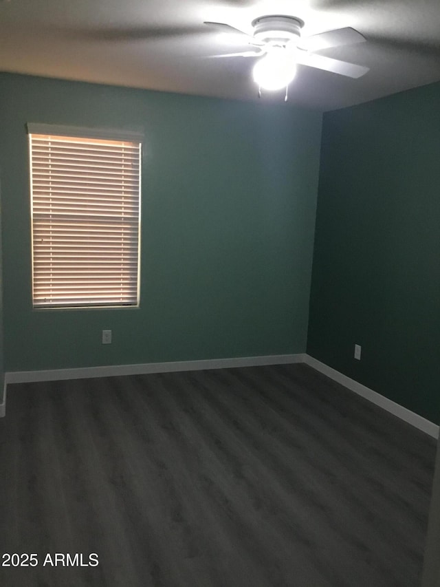 4722 S 238th Ln, Buckeye, AZ 85326 - unfurnished room with ceiling fan, dark wood-style floors, and baseboards
