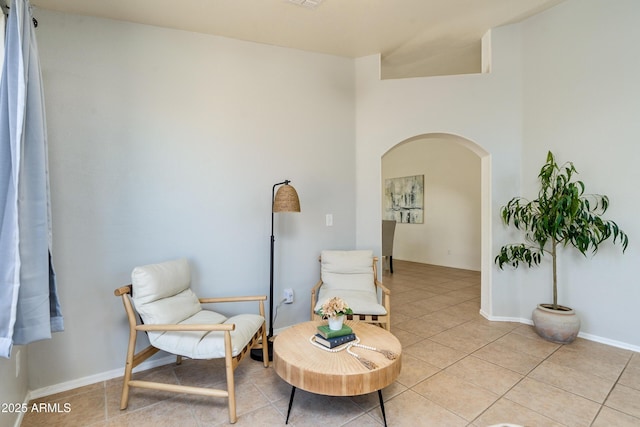 sitting room with light tile patterned flooring