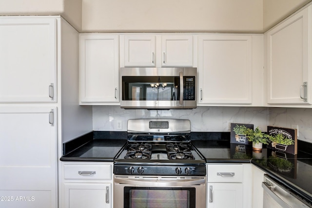 kitchen with tasteful backsplash, a notable chandelier, stainless steel appliances, and white cabinets