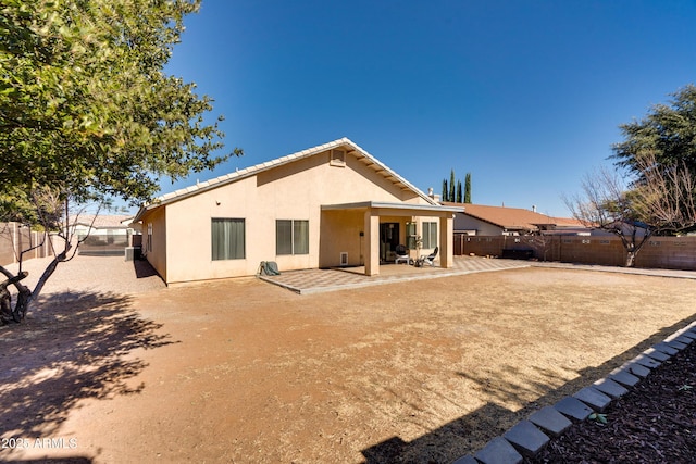 back of house featuring a patio