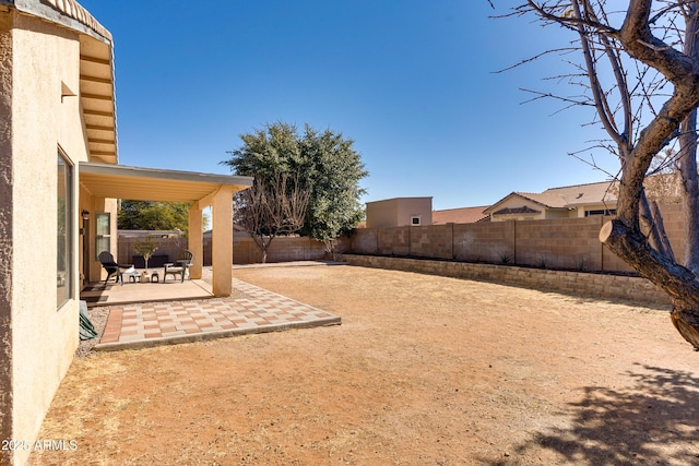 view of yard featuring a patio