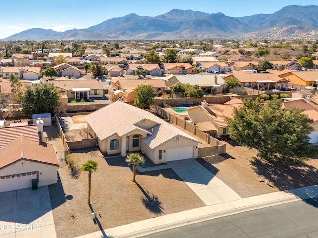 drone / aerial view featuring a mountain view