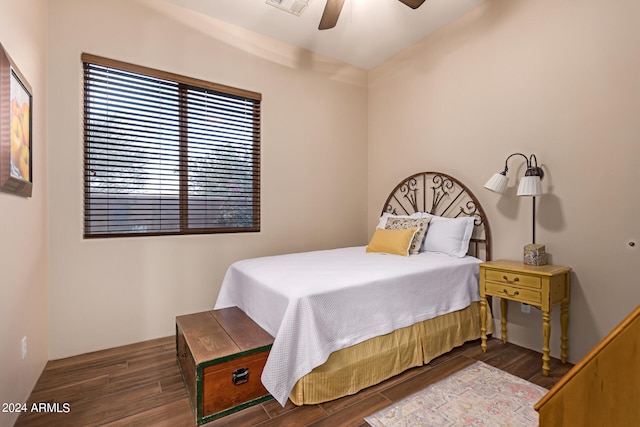 bedroom featuring ceiling fan and dark hardwood / wood-style floors