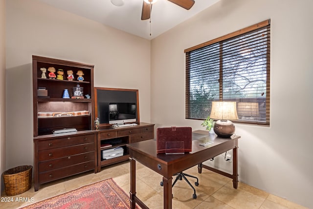 office with ceiling fan and light tile patterned flooring