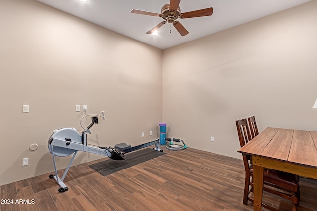 exercise room with a ceiling fan, recessed lighting, and wood finished floors