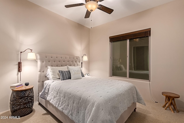 bedroom with ceiling fan and light colored carpet