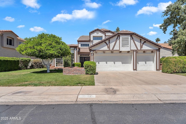 view of front of property featuring a garage, stucco siding, driveway, and a front lawn