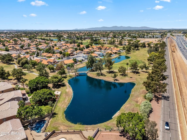 bird's eye view with a residential view and a water and mountain view