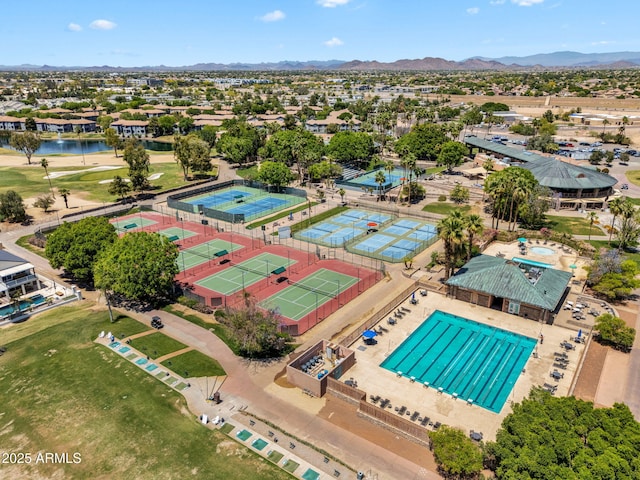 bird's eye view featuring a water and mountain view and a residential view