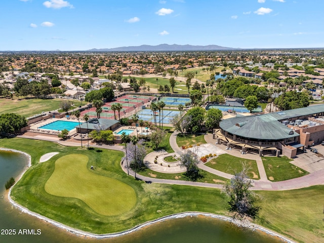 bird's eye view featuring a water and mountain view and view of golf course