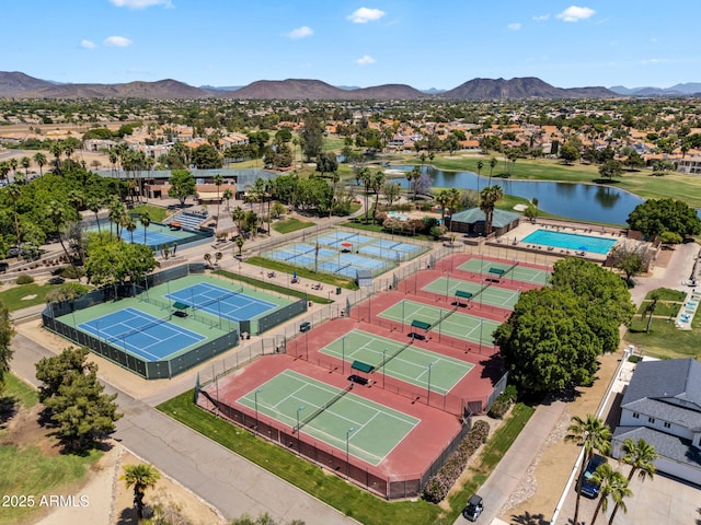 birds eye view of property with a residential view and a water and mountain view