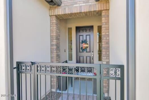 doorway to property featuring stone siding