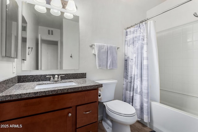 full bathroom featuring vanity, toilet, and shower / bath combo with shower curtain