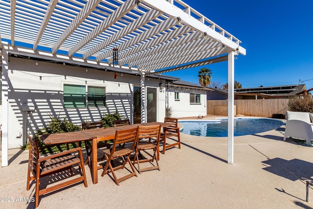 view of pool with a pergola and a patio