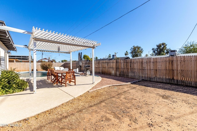 view of yard featuring a fenced in pool, a pergola, and a patio