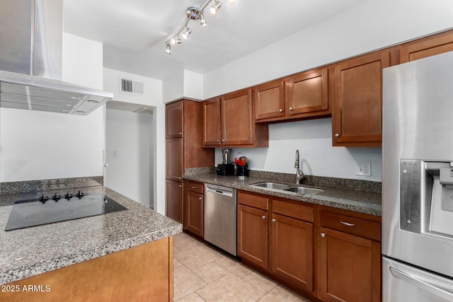 kitchen with light tile patterned floors, stainless steel appliances, sink, and island range hood