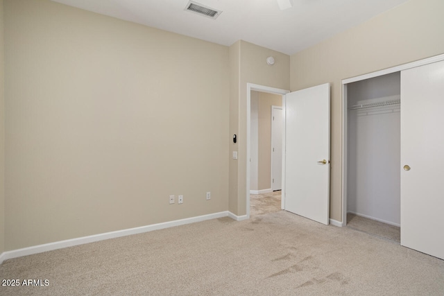20007 N Siesta Rock Dr, Surprise, AZ 85374 - unfurnished bedroom featuring carpet, a closet, and baseboards