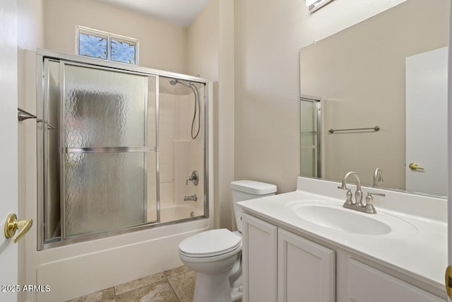 20007 N Siesta Rock Dr, Surprise, AZ 85374 - full bathroom featuring toilet, vanity, and shower / bath combination with glass door