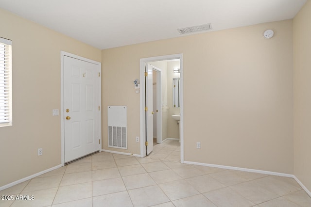 20007 N Siesta Rock Dr, Surprise, AZ 85374 - unfurnished bedroom with baseboards and light tile patterned floors