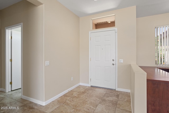 20007 N Siesta Rock Dr, Surprise, AZ 85374 - foyer entrance with baseboards and light tile patterned flooring