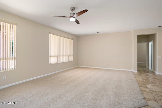 20007 N Siesta Rock Dr, Surprise, AZ 85374 - unfurnished room featuring ceiling fan, healthy amount of natural light, and baseboards