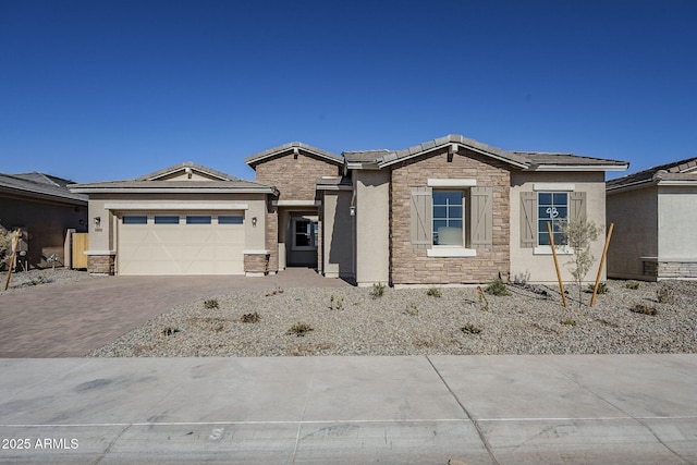 view of front of property with a garage