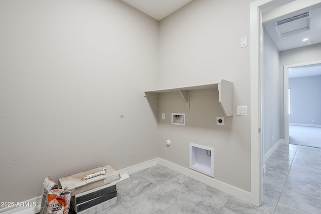 washroom with electric dryer hookup, washer hookup, light tile patterned floors, and hookup for a gas dryer