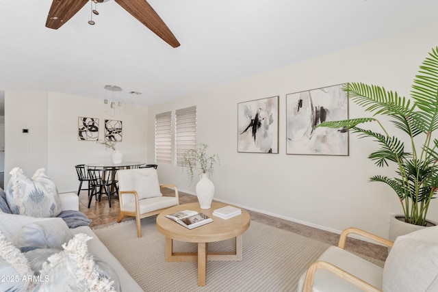 973 E Kelsi Ave, San Tan Valley, AZ 85140 - living area with baseboards and ceiling fan