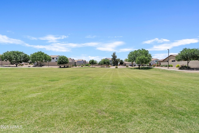 973 E Kelsi Ave, San Tan Valley, AZ 85140 - view of grassy yard featuring a residential view