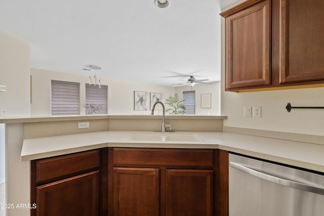 973 E Kelsi Ave, San Tan Valley, AZ 85140 - kitchen with a sink, dishwasher, light countertops, a ceiling fan, and brown cabinets