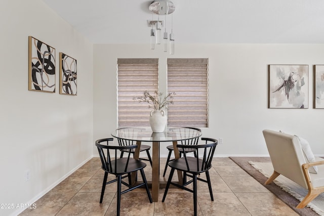 973 E Kelsi Ave, San Tan Valley, AZ 85140 - dining room with tile patterned flooring and baseboards
