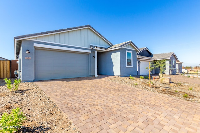 ranch-style house with a garage