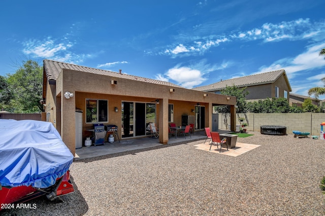 back of house featuring a patio