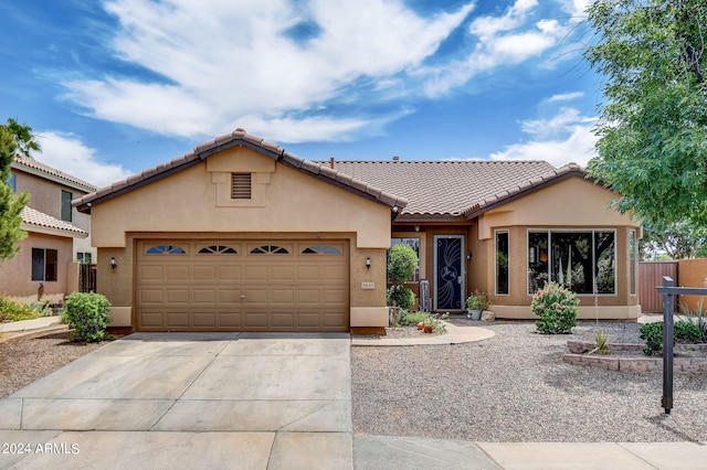 view of front of house with a garage