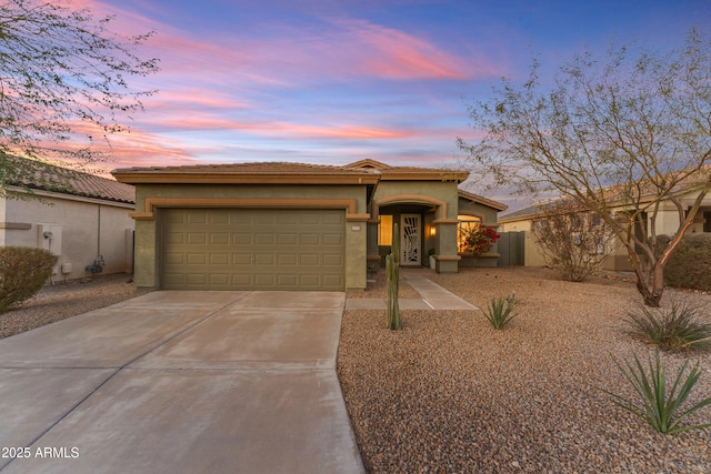 view of front of property featuring a garage